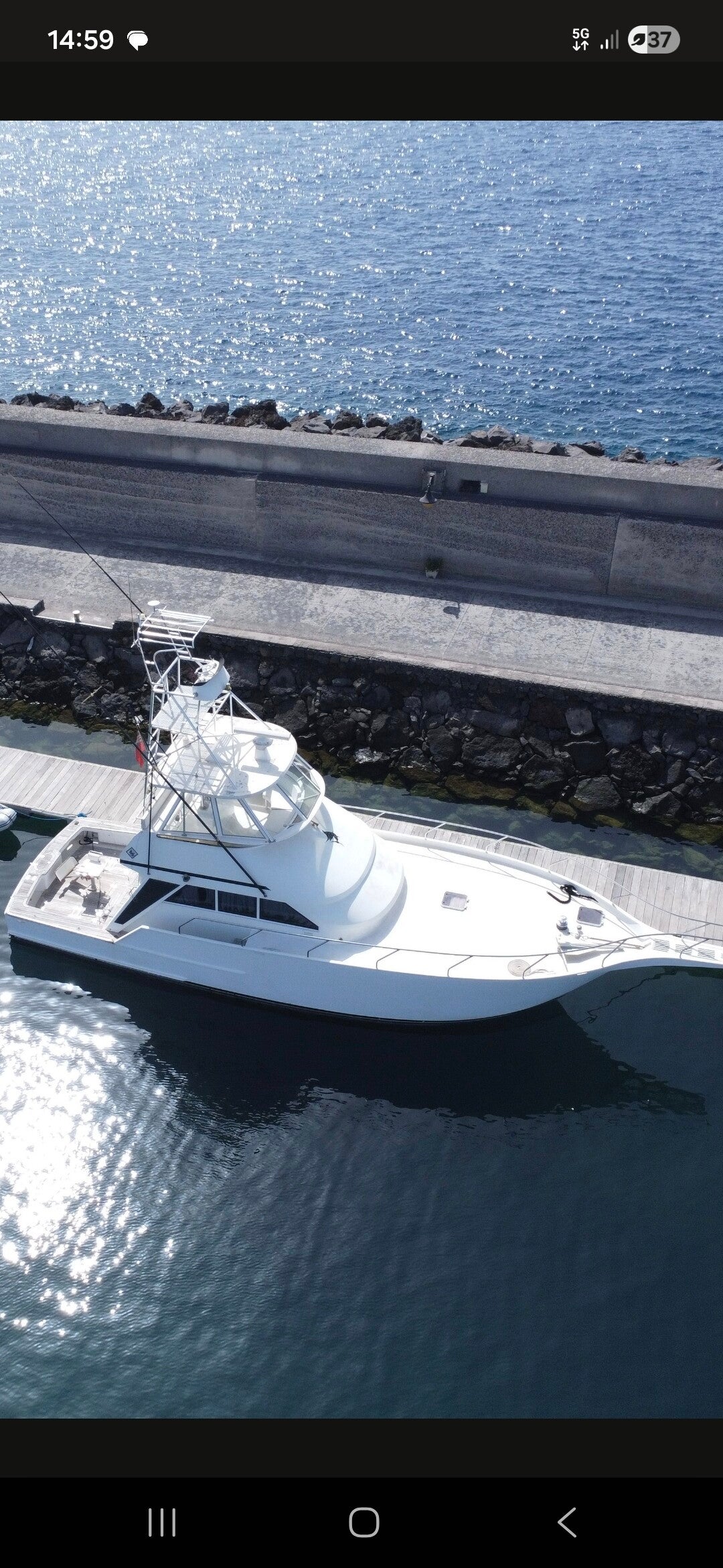 White yacht in a marina, yacht care in Lanzarote
